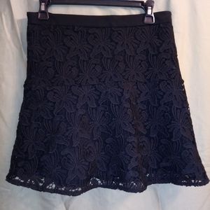 Black lace mini skirt